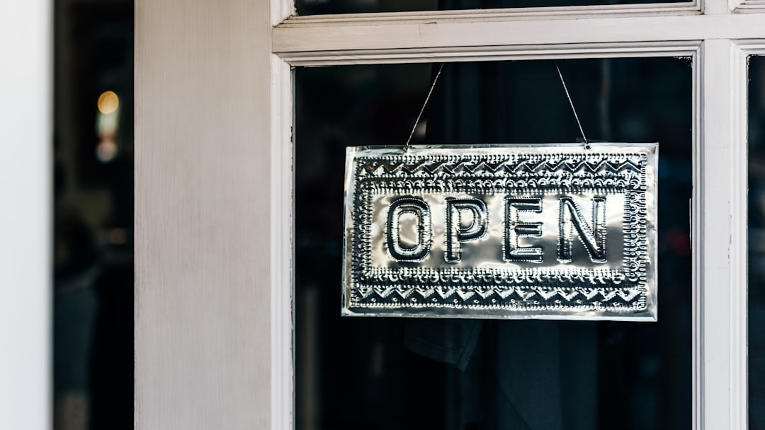 black and white wooden welcome signage