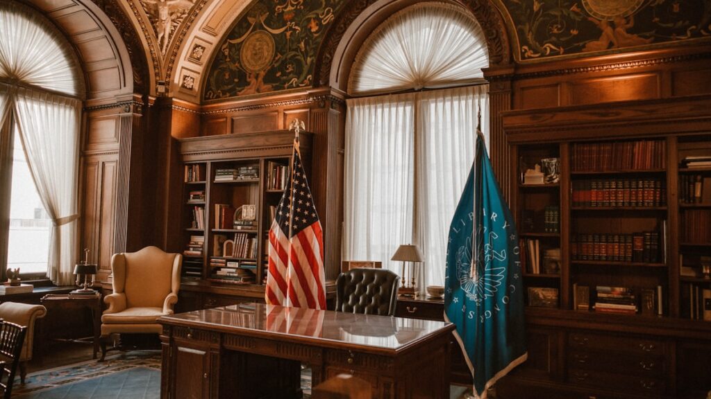 Grand office with flags and bookshelves
