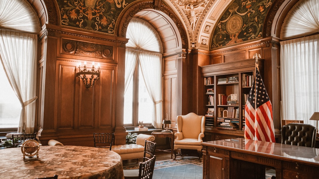Ornate office with american flag and antique furniture