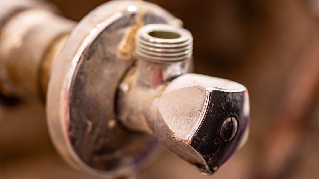 A close up of a water faucet with nozzles