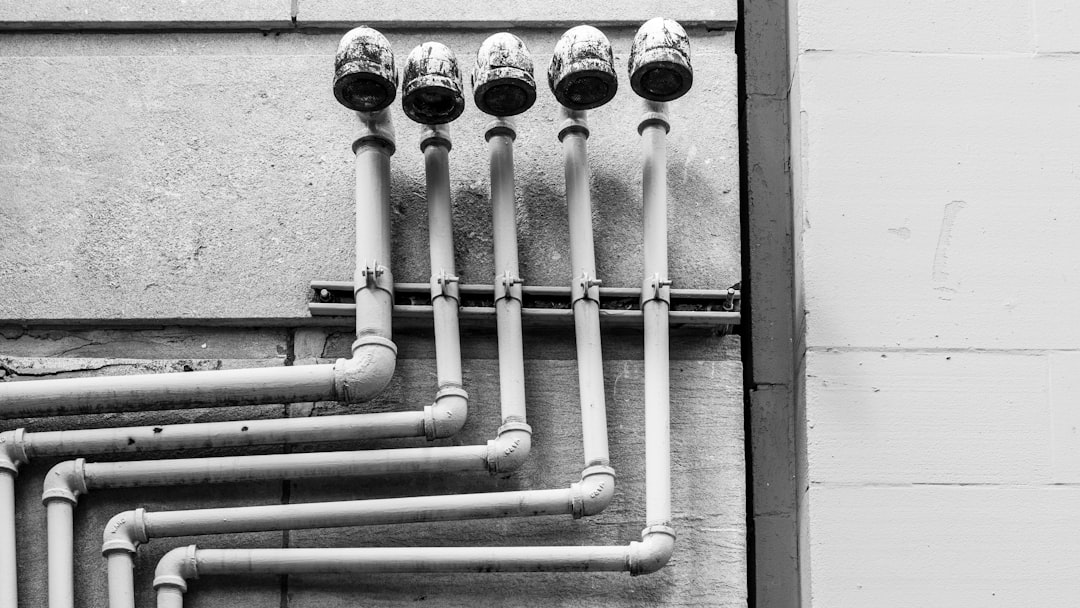 white and black metal pipe