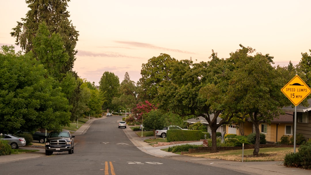 A street that has a yellow street sign on it