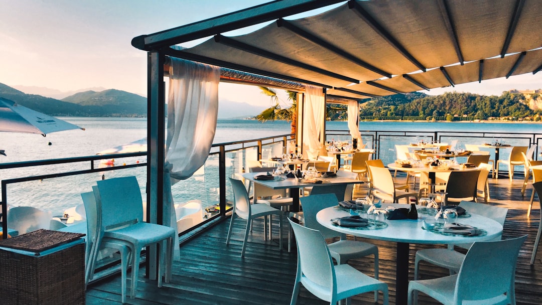 a restaurant with a view of the water