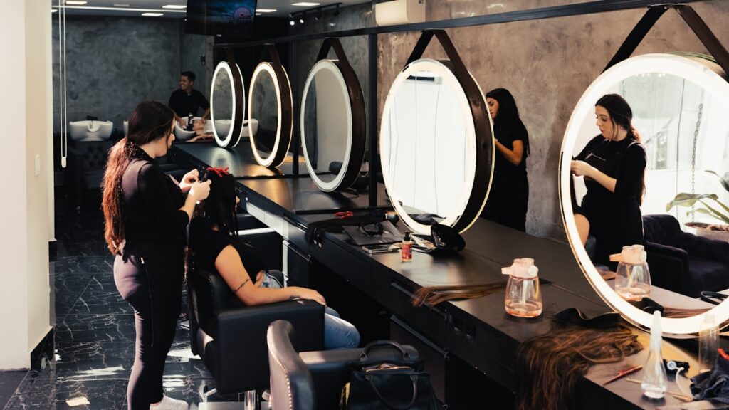 a woman getting her hair done in a salon