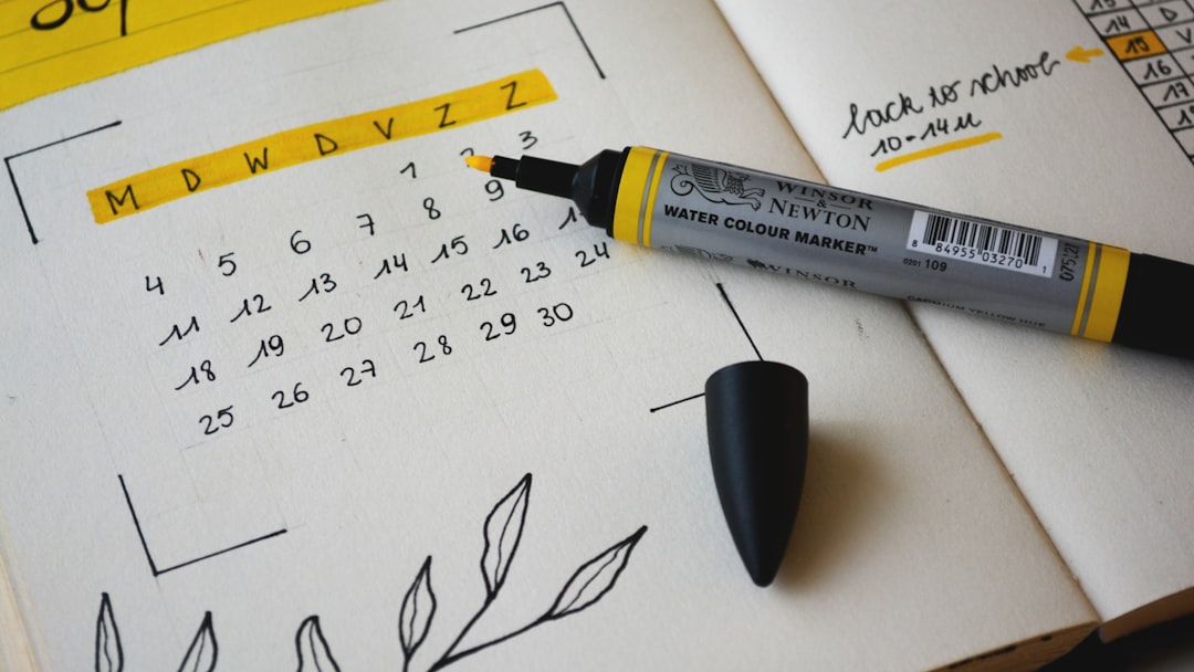 black marker on notebook