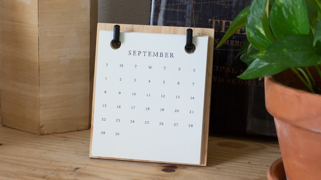 white braille paper on brown wooden table