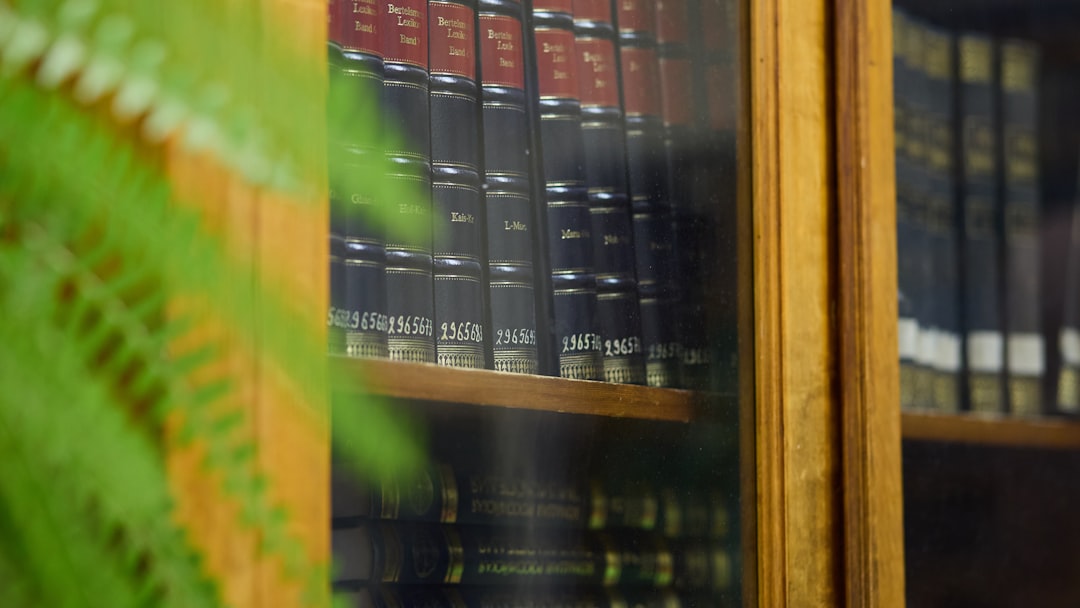 Bookshelves filled with old books in a library.